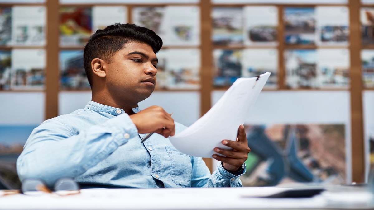 Student preparing university registration and scholarship documents for an Algeria student visa application