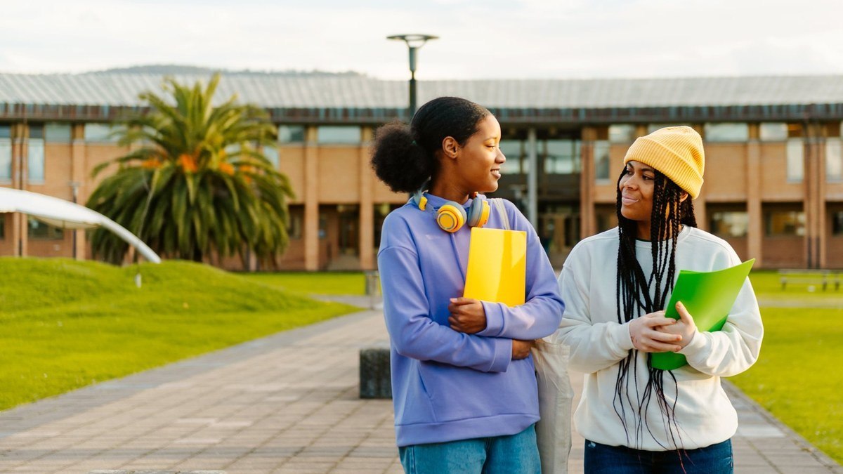 International students walking on a university campus — Bangladeshi applicants register at the University of Botswana before the residence permit is filed