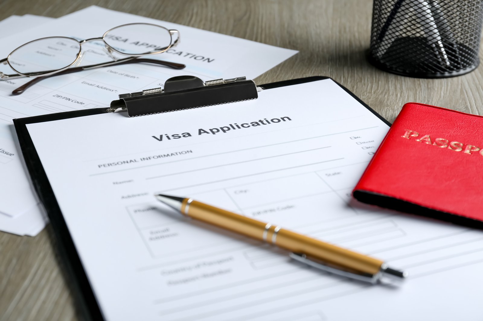 Bangladeshi student preparing China student visa documents including JW202 form and admission letter for the X1 application