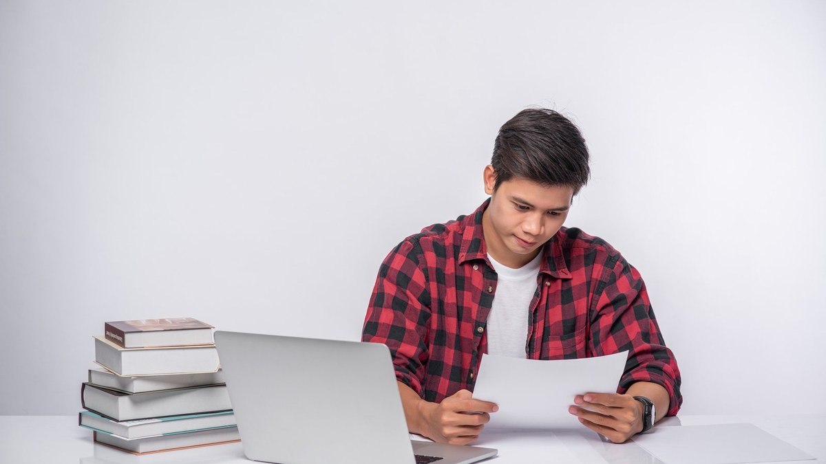 Student preparing academic transcripts and documents for a Japanese MEXT scholarship application from Bangladesh