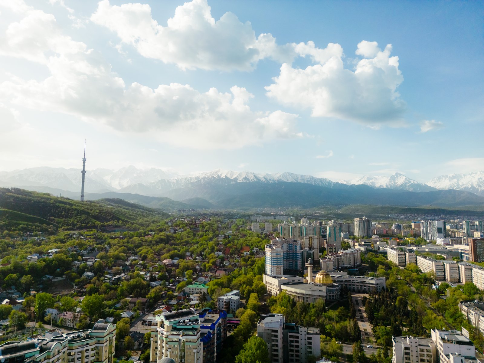 Almaty city view with mountains behind, where Bangladeshi students on a Kazakhstan C-9 student visa study