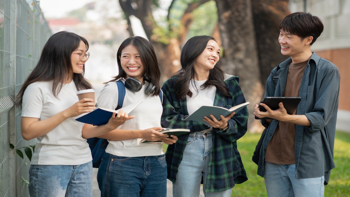 International students talking together on a university campus in Malaysia