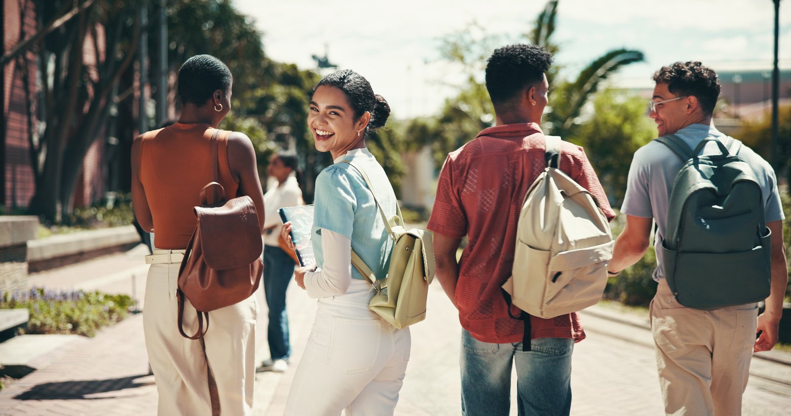 Students walking on a university campus — top universities in Malaysia 2027