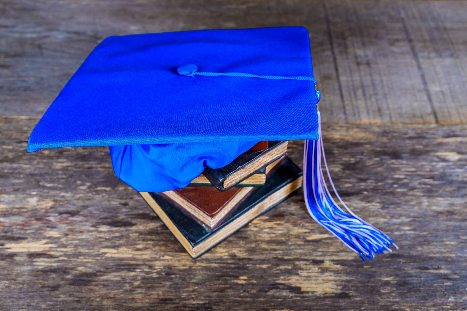 Graduation cap on books — scholarships for Bangladeshi students in Malta 2027