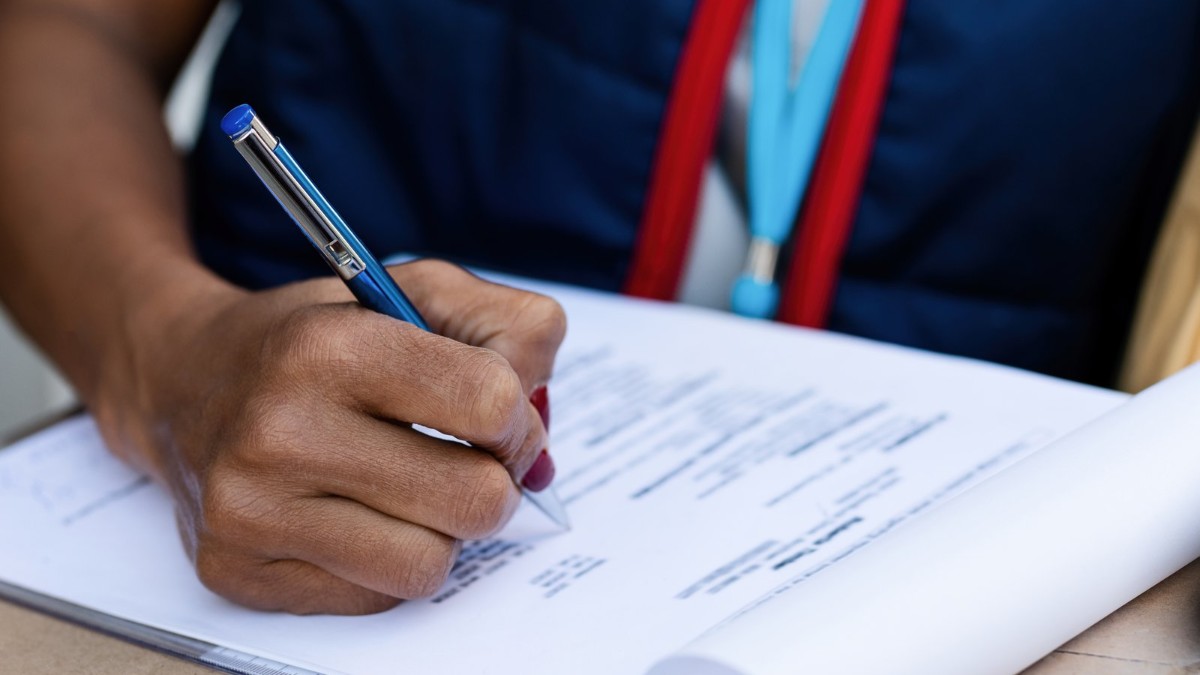 Bangladeshi student preparing Spain student visa documents and financial papers for the Embassy of Spain in Dhaka