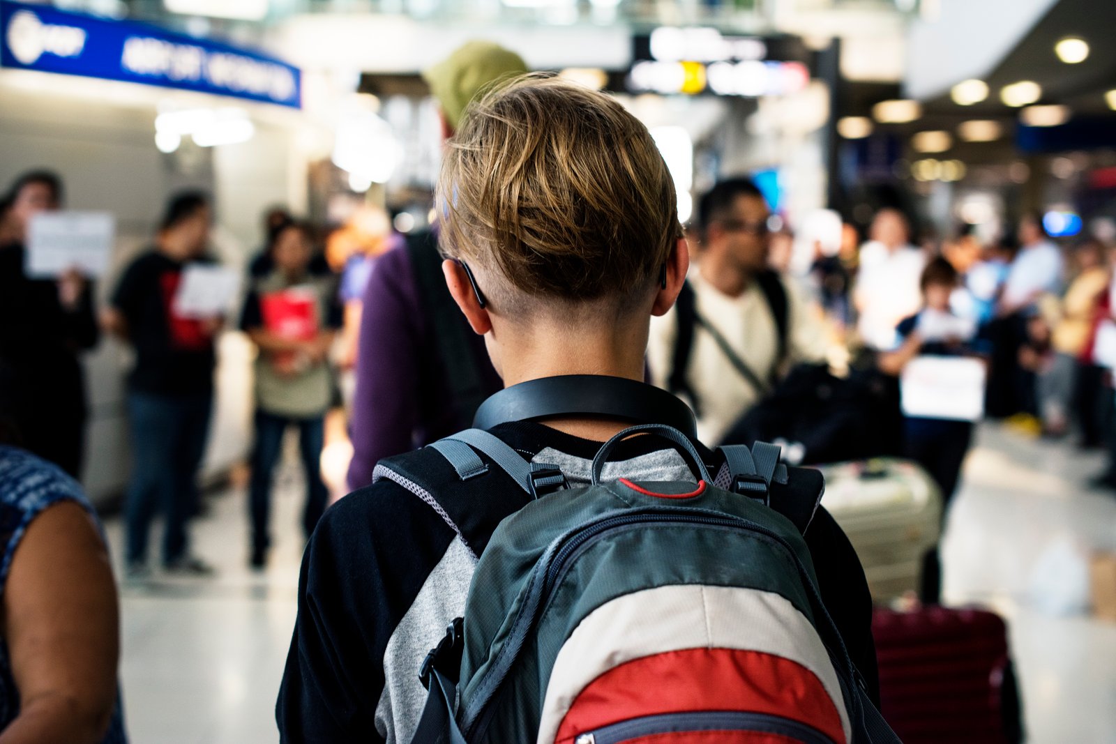 Bangladeshi student with backpack at the airport departing to study abroad in 2026